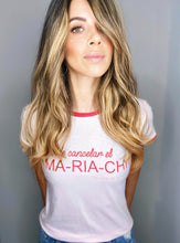 Cargar imagen en el visor de la galería, Camiseta setenteras Flint de mujer cuello redondo. Cool, retro y funky. Disponible en tallas S,M y L. 4 colores azul, rosada, lila y naranja, con rib de colores en cuello y mangas. Frases inspiradas en Paulina de la Mora de la serie Mexicana "La casa de las flores". Fabricada en algodón Peruano. Producto hecho en Colombia. Compra online